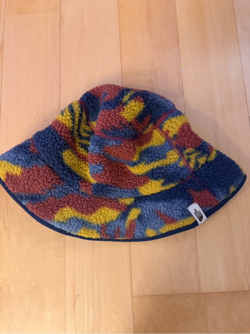 The North Face Navy Bucket Hat with Multicolor Fleece Lining